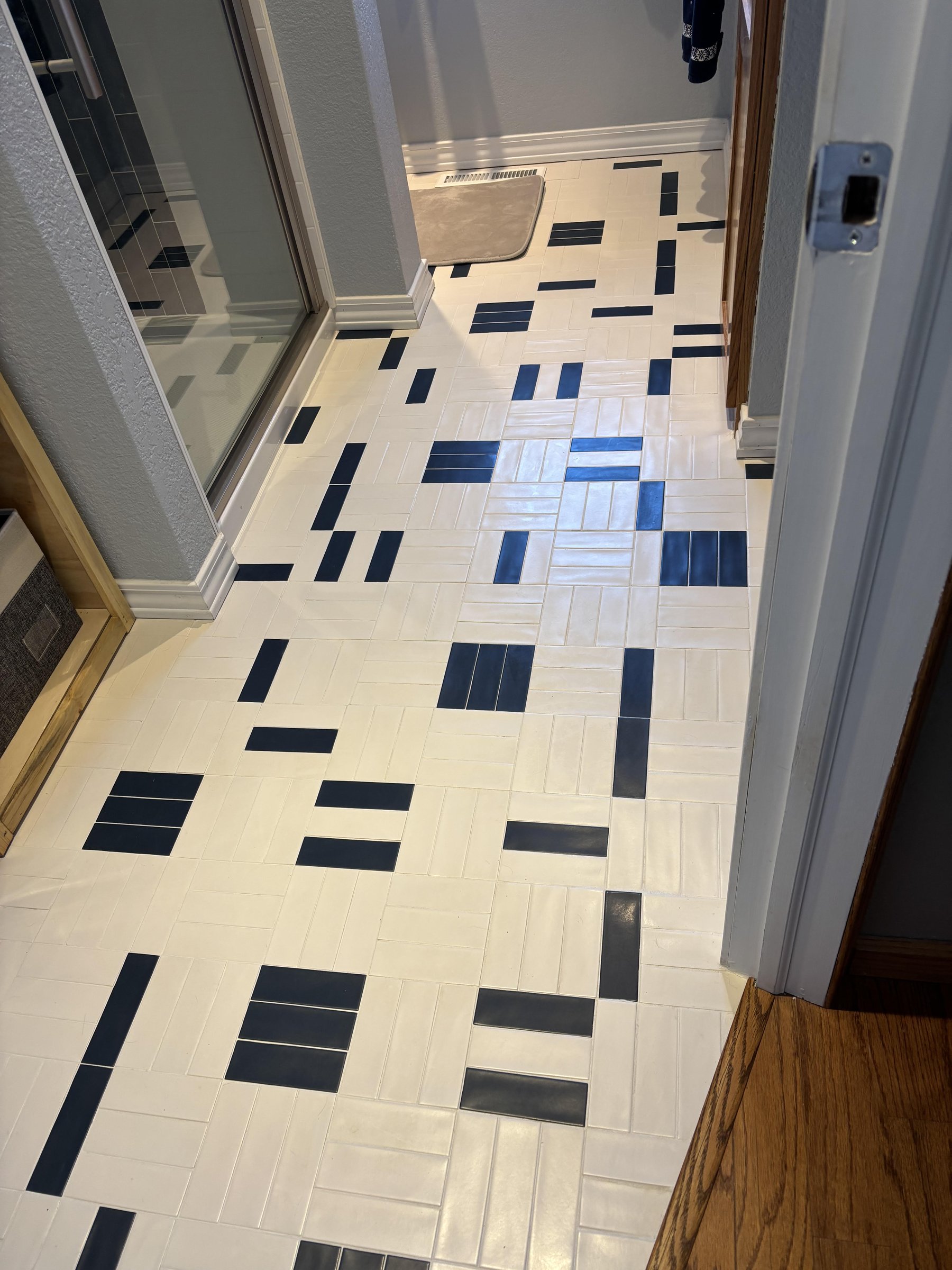 Blue and White Bathroom Tile Floor